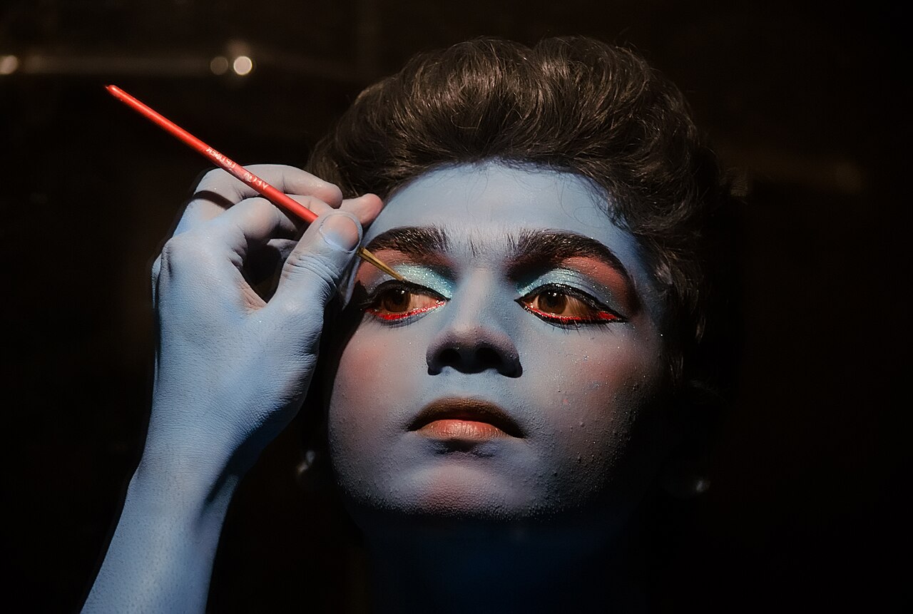 Makeup artist applying product carefully