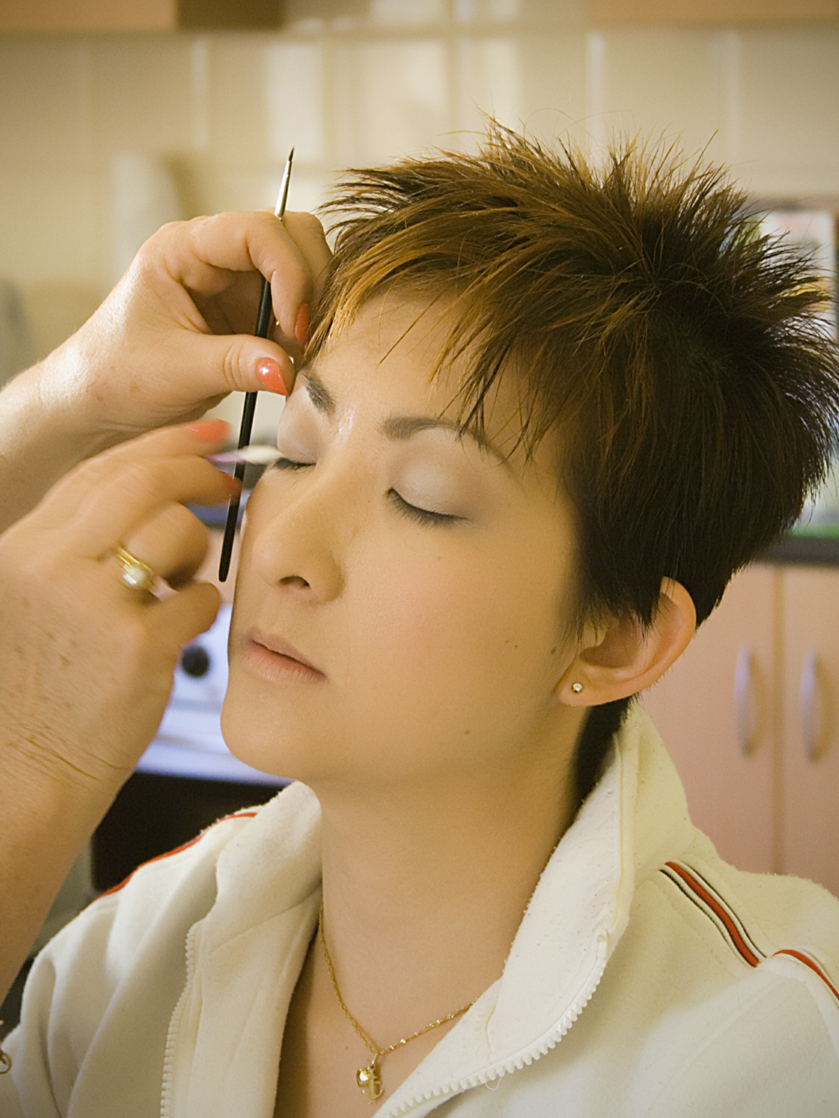 Close-up of makeup preparation before an event